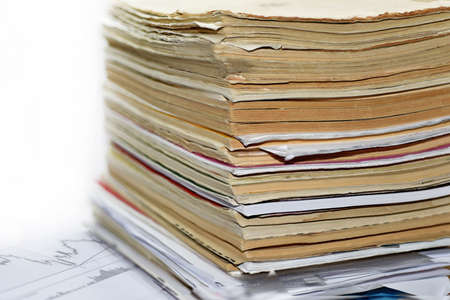 Old documents on table. Isolated on white background.の写真素材