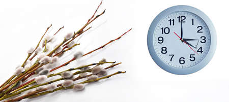 Isolated electronic wall clock. Goes to Summer timeの写真素材