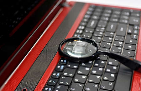 Abstract composition of searching in Internet. Laptop isolated on white background.の写真素材