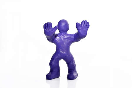man figure made from plasticine. Isolated on white background.の写真素材