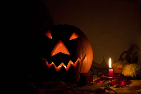 Halloween pumpkin head jack lantern with scary evil faces spooky holidayの写真素材
