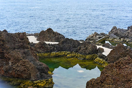 Wild ocean waves near to Madeira island.の写真素材