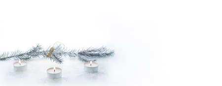 Abstract Christmas composition. Winter abstraction. Christmas decorations on white table with design elements. Can be uses as horizontal banner.の写真素材