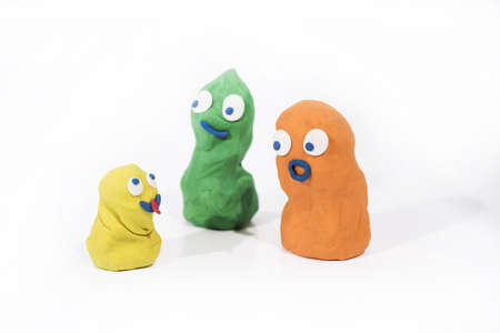 Abstract persons made from Play Clay. Property price and credit abstraction.