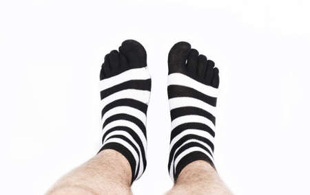 Legs in fashion and modern socks. Isolated on white background.の写真素材