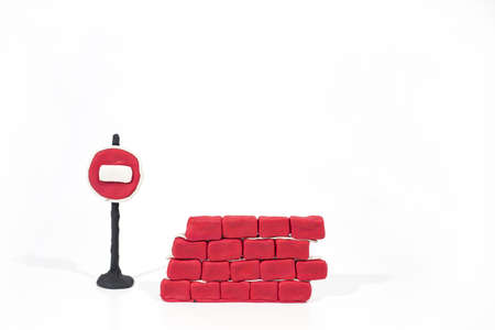 Abstract photo of buildings works. Figures made from Play Clay. Isolated on white background.の写真素材