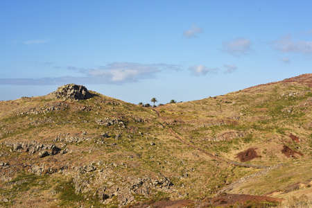 Sunny summer day. Hight mountains near ocean coasts