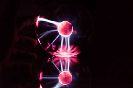 Electricity fire-ball. Abstract photo of electric waves. Static electricityの写真素材