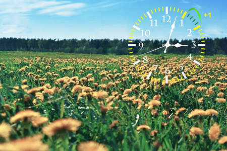 Daylight Saving Time. DST. Wall Clock going to winter time. Turn time forward. Abstract photo of changing time at spring.の写真素材