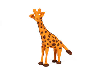Plasticine artwork. Handmade giraffe. Abstract isolated photo.の写真素材