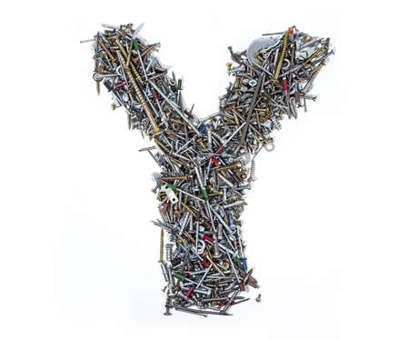 A lot of cogs, screws, bolts and moods on a white background. Latin alphabet letter.の写真素材