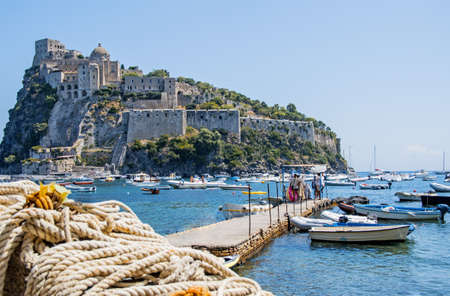 Ancient castle near Ischia island. Tourist target when traveling in Campania. Italy.の写真素材