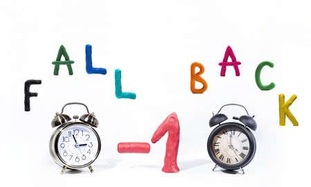 Daylight Saving Time. Wall Clock going to winter time. Autumn abstraction. Fall back time.の写真素材