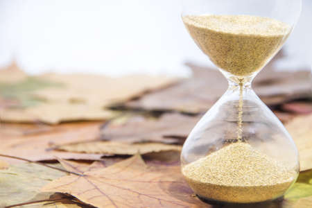 Daylight Saving Time. Wall Clock going to winter time. Autumn abstraction. Fall back time.の写真素材