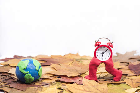 Daylight Saving Time. Wall Clock going to winter time. Autumn abstraction. Fall back time.