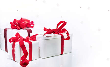 Abstract Christmas composition. Winter abstraction. Christmas decorations on white table with design...