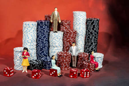 Casino abstract photo. Poker game on red background. Theme of gambling.