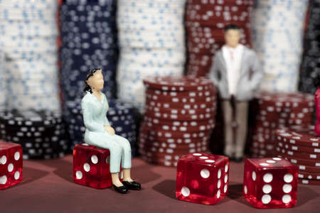 Casino abstract photo. Poker game on red background. Theme of gambling.
