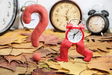 Daylight Saving Time. Wall Clock going to winter time. Autumn abstraction. Fall back time.