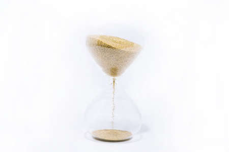 Time abstraction. Hourglass isolated on white backgroundの写真素材