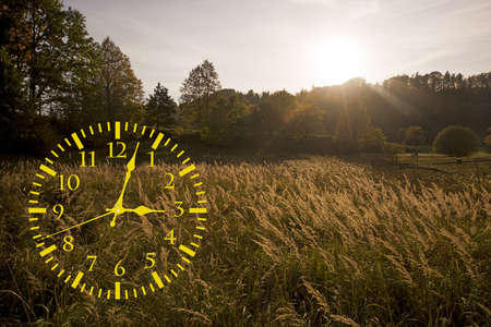 Autumn landscape abstraction. Fall back time. Daylight saving time.の写真素材
