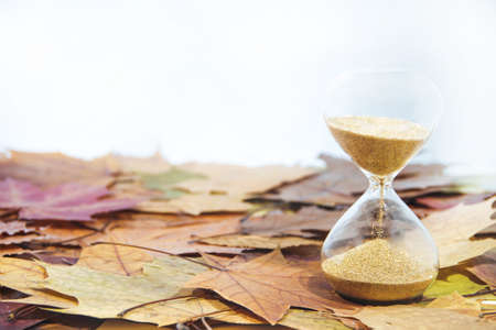 Daylight Saving Time. Wall Clock going to winter time. Autumn abstraction. Fall back time.の写真素材