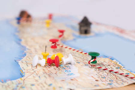 Abstract idea of rent a car. Small car on map. Abstract travel photo.