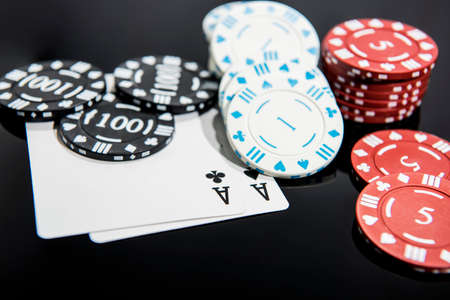Casino abstract photo. Poker game on red background.  Theme of gambling.の写真素材