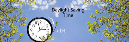 Daylight Saving Time (DST). Blue sky with white clouds and clock. Turn time forward (+1h).の写真素材