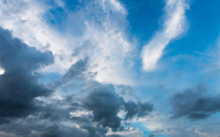 colorful dramatic sky with cloud at sunsetの写真素材