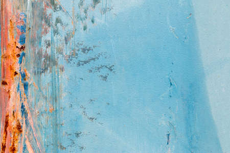 A background of peeling paint and rusty old metalの写真素材