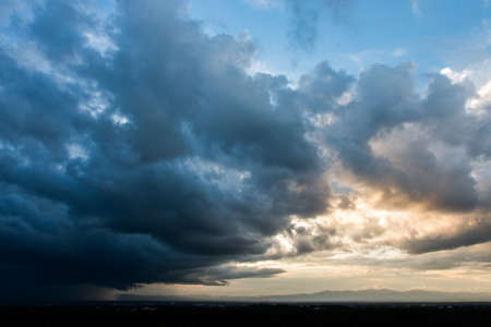 colorful dramatic sky with cloud at sunsetの写真素材