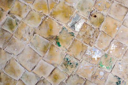 Colorful old stone mosaic on the wall.の写真素材
