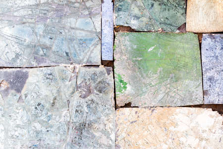 Colorful old stone mosaic on the wall.の写真素材