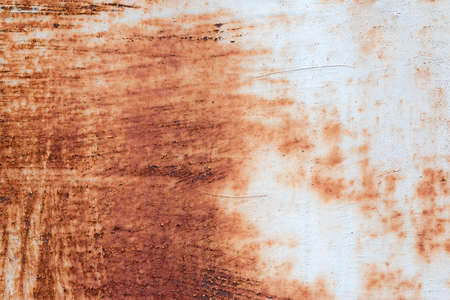 A background of peeling paint and rusty old metal