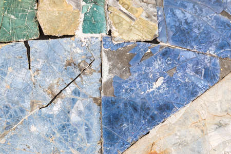 Colorful old stone mosaic on the wall.の写真素材