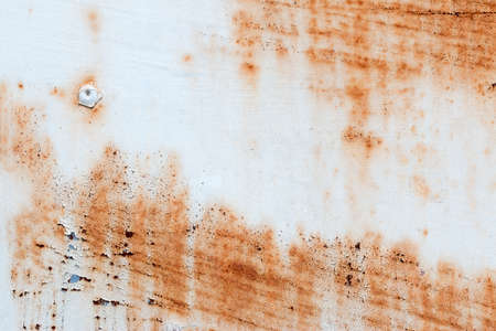 A background of peeling paint and rusty old metalの写真素材