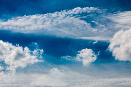 colorful dramatic sky with cloud at sunsetの写真素材