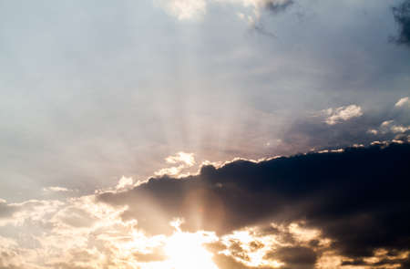 colorful dramatic sky with cloud at sunsetの写真素材