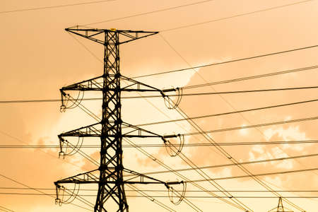 silhouette of high voltage electrical pole structureの写真素材