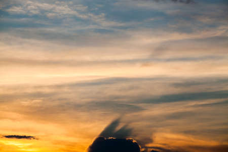 colorful dramatic sky with cloud at sunsetの写真素材