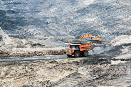 Part of a pit with big mining truck workingの写真素材