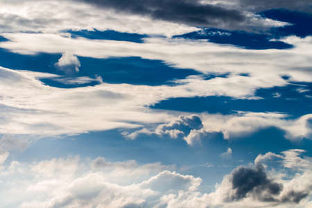 colorful dramatic sky with cloud at sunsetの写真素材