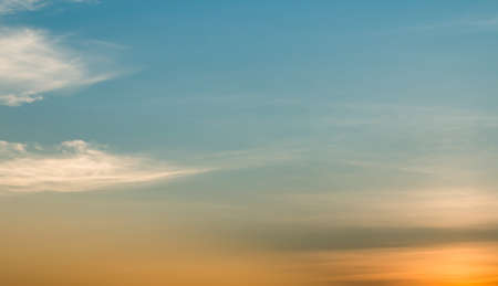 colorful dramatic sky with cloud at sunsetの写真素材