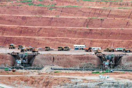 Part of a pit with big mining truck working