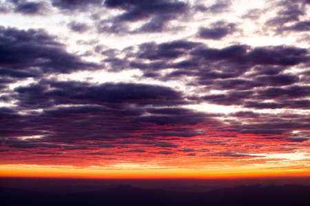 colorful dramatic sky with cloud at sunset