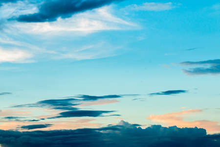 colorful dramatic sky with cloud at sunsetの写真素材