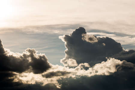colorful dramatic sky with cloud at sunsetの写真素材