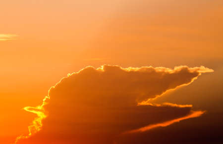 colorful dramatic sky with cloud at sunsetの写真素材