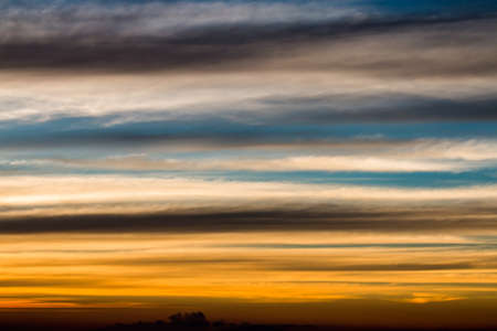 colorful dramatic sky with cloud at sunset